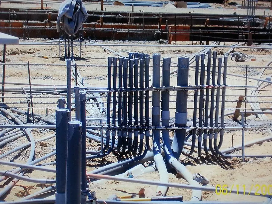 Image of an outdoor construction site in Petaluma with organized underground electrical conduits ready for installation by B. Henry's Quality Electric Inc.