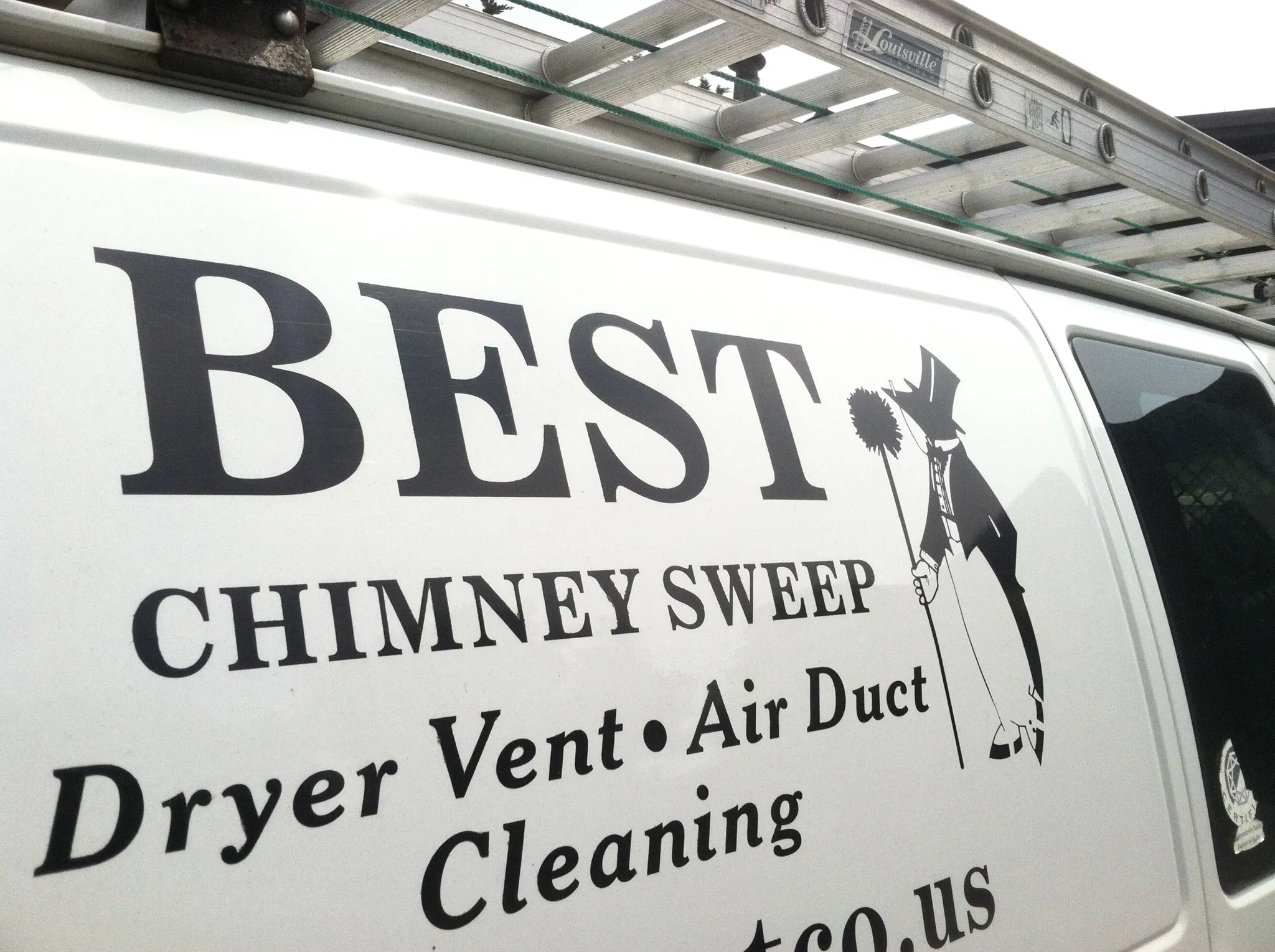 A van with the Best Chimney Sweep logo, featuring services in dryer vent and air duct cleaning, located in Santa Rosa.