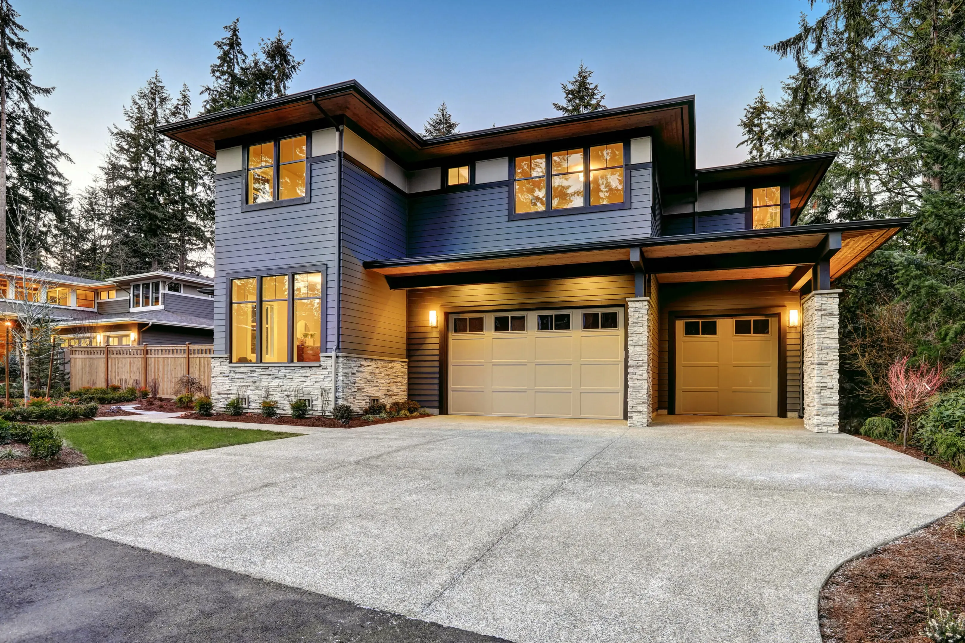 A modern two-story house in San Jose, featuring large windows and a double garage, constructed by Best Construction.