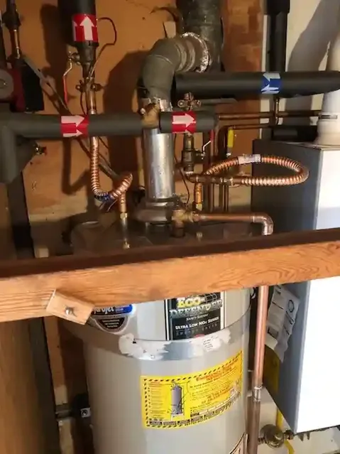 A water heater installation showcasing intricate piping and controls, provided by Better Water Heaters, Inc. in San Jose.