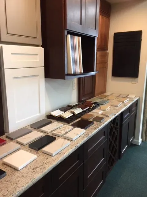 A variety of cabinet door samples and countertop materials displayed in a showroom at Cabinets 101 in Rohnert Park.