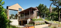 A modern house with sleek architecture and landscaping in Discovery Bay, designed by California Aqua Pros.