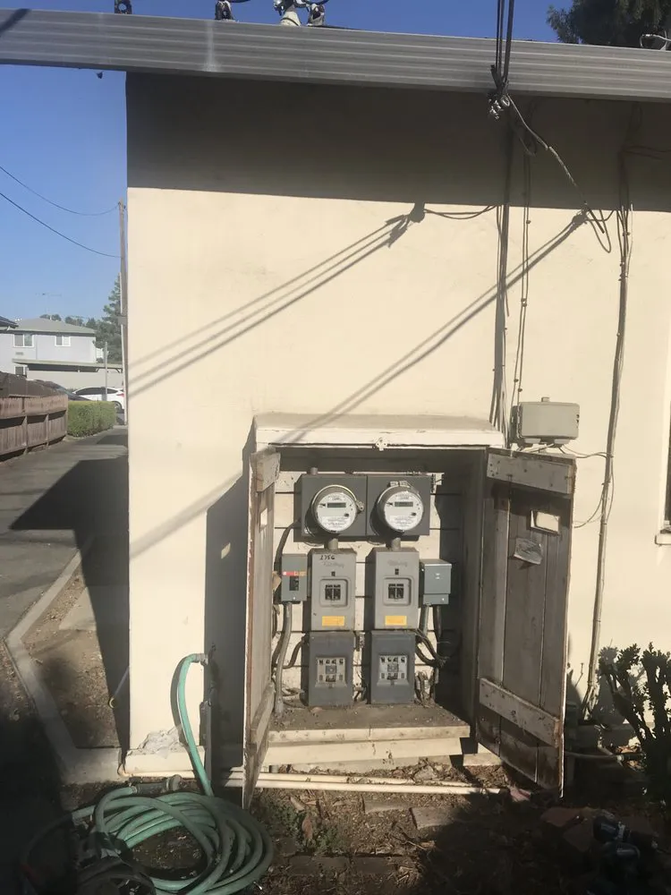Outdoor electrical utility cabinet with meters and wiring in Morgan Hill, operated by California Power and Light.