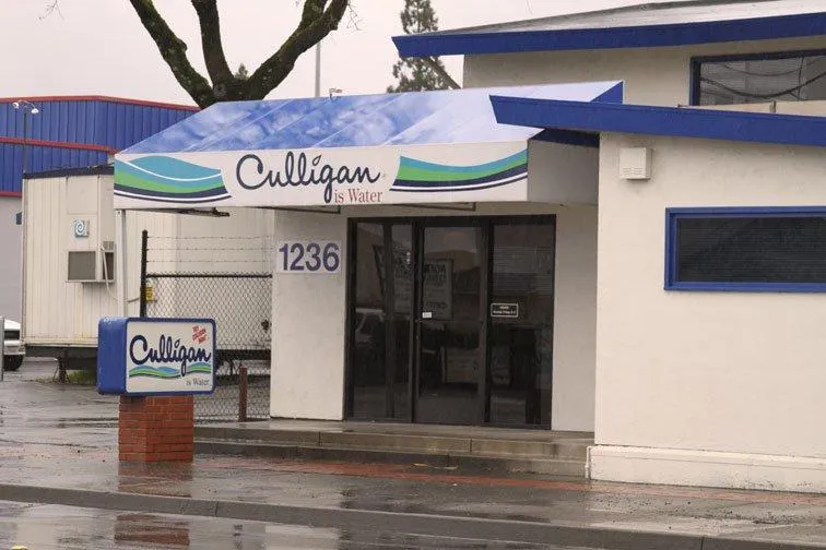 Front entrance of Culligan Water of Sonoma County in Santa Rosa, featuring a canopy with the company logo and building number 1236.
