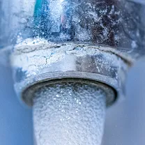 Close-up image of a faucet with mineral buildup, highlighting the need for Culligan Water of Sonoma County services in Santa Rosa.