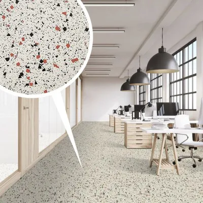 An office interior featuring modern desks and lighting, with a focus on speckled flooring by Danville Hardwood Company in Danville.