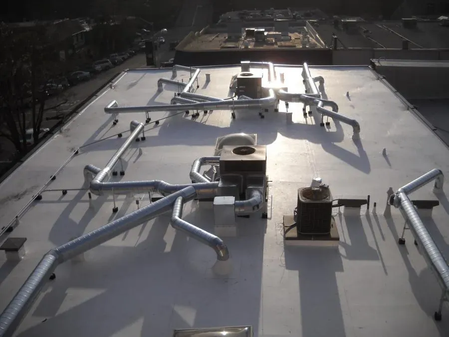 Rooftop view of an HVAC system with various ducts and units, installed by Degree HVAC, Inc. in Redwood City.