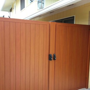 A wooden gate installation by Duce Construction, Inc., showcasing quality craftsmanship in Walnut Creek.