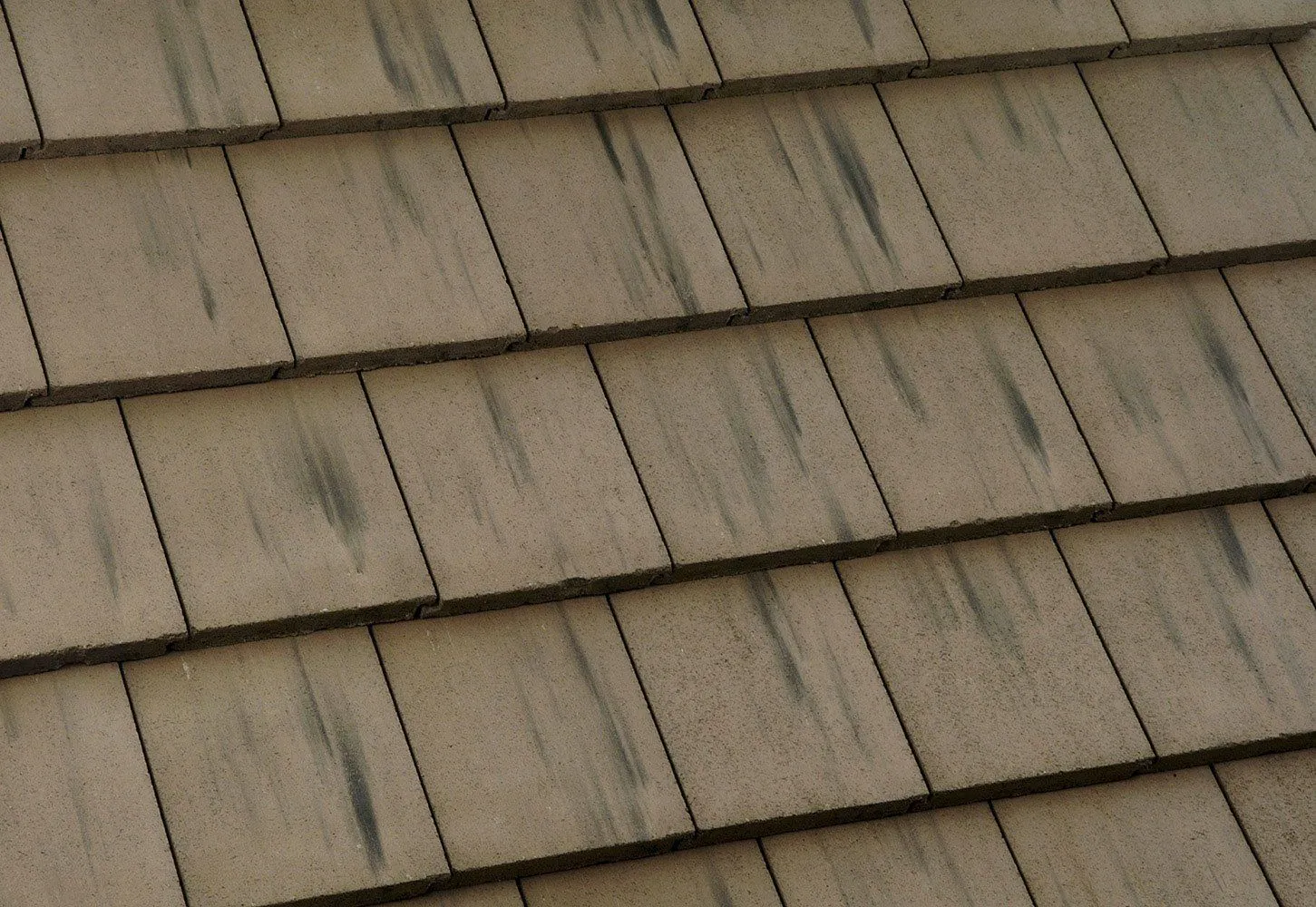 "Close-up view of brown roof shingles with subtle weathering, installed by Dynamic Roofing Inc. in Antioch."