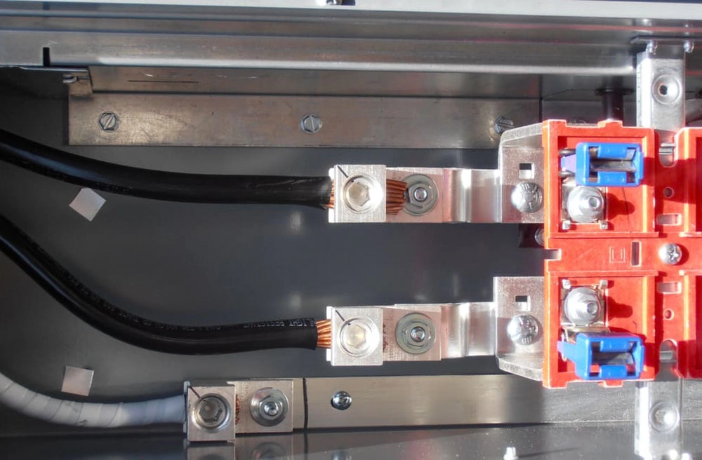 "Close-up view of an electrical panel showing cables and connectors, illustrating the meticulous work by E.G. Electrical Services in Campbell."