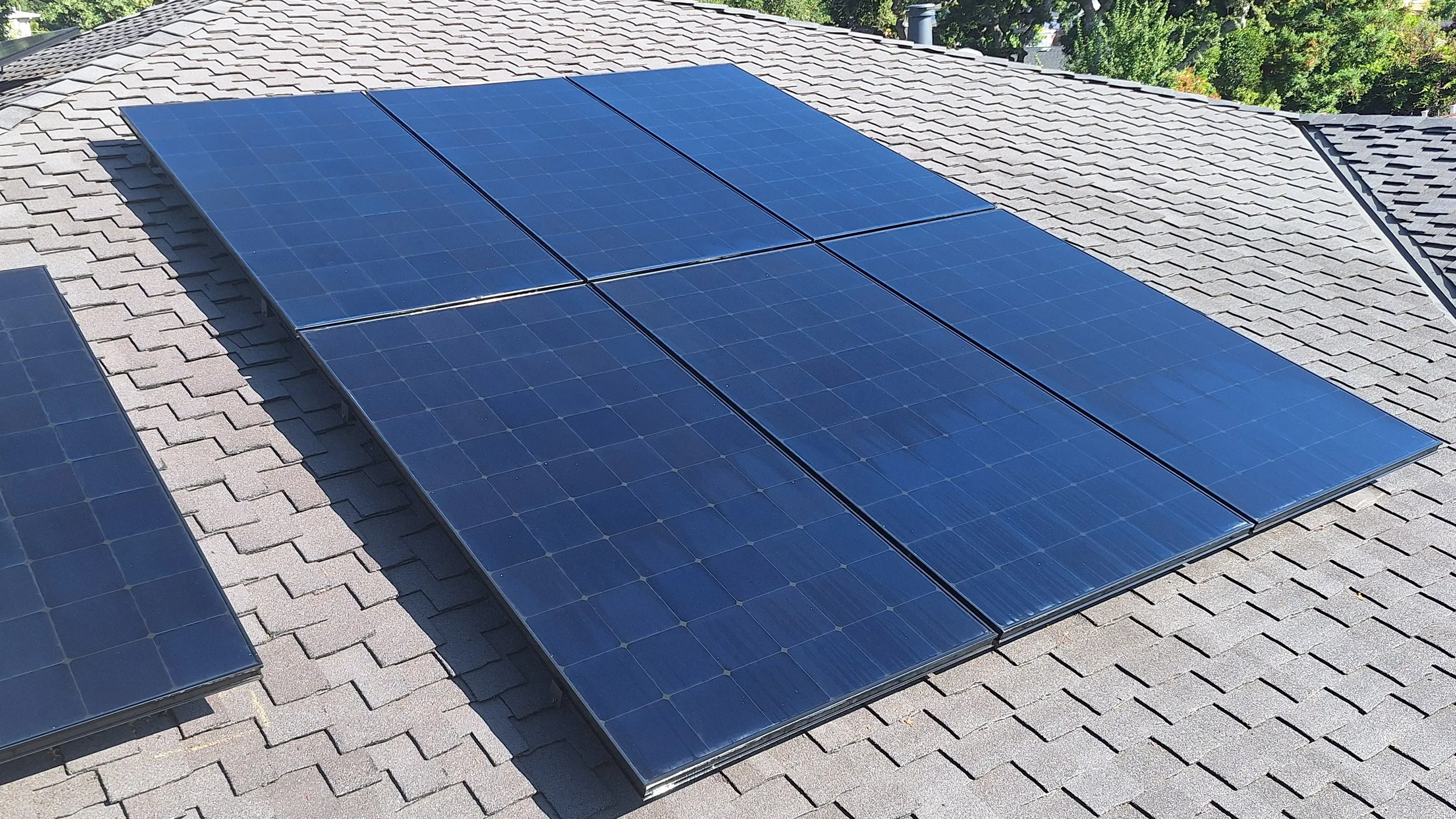 "A solar panel installation on a roof in Campbell by Freedom Solar, Inc., showcasing modern solar energy technology."