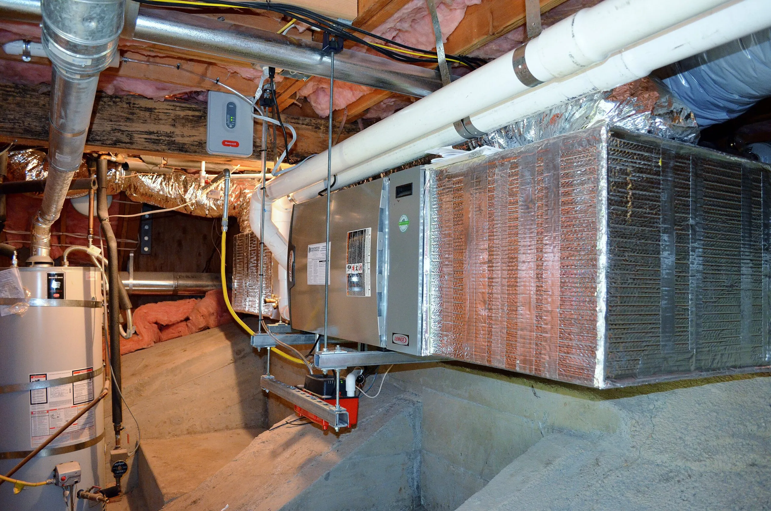 Basement HVAC installation with ductwork and heating system showcasing professional workmanship by Innovative Mechanical, Inc. in South San Francisco.