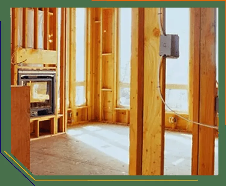 Interior view of a room under construction with visible wooden framing and electrical wiring, executed by Integrity Electric, Inc. in San Rafael.