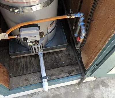 A water heater installation in Santa Clara by Plumbtree Plumbing and Rooter Inc., showcasing pipes and connections.