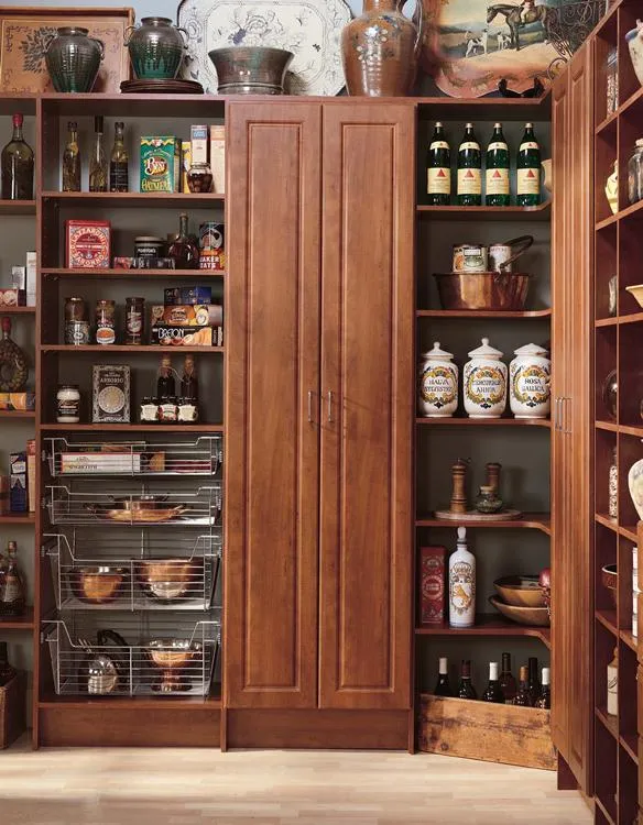 Wooden pantry shelves by PremierGarage featuring neatly organized items such as jars, bottles, and kitchen essentials, located in San Mateo.