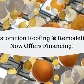 A festive display of orange, white, and gold balloons with a sign announcing financing options from Restoration Roofing & Remodeling, LLC in Spring.