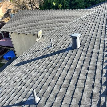 "A newly installed shingle roof with multiple vents, showcasing the craftsmanship of Sersiv Roofing Corporation in Sunnyvale."