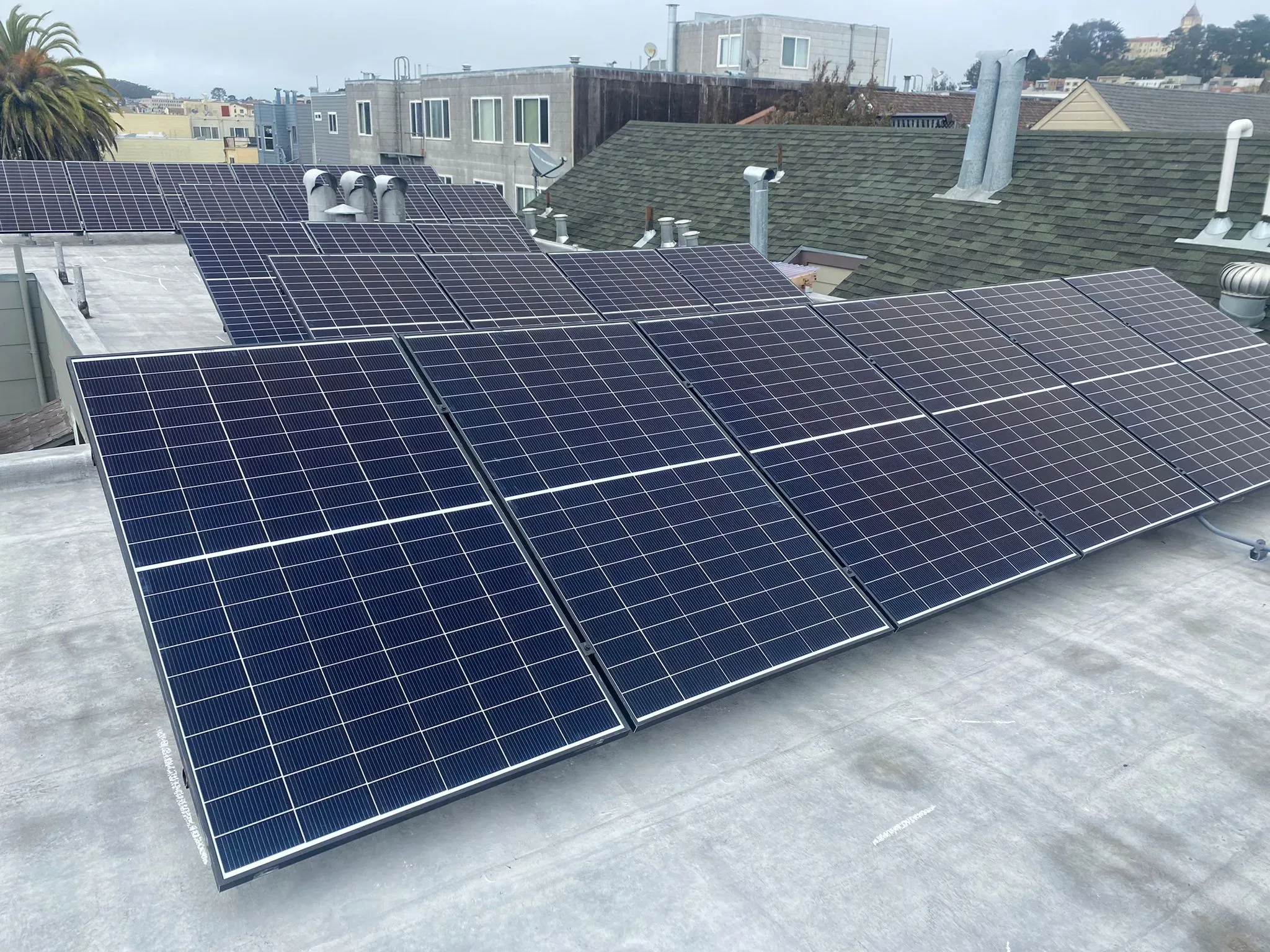 "A rooftop in San Francisco featuring SolarUnion's newly installed solar panels, providing an example of efficient renewable energy use."
