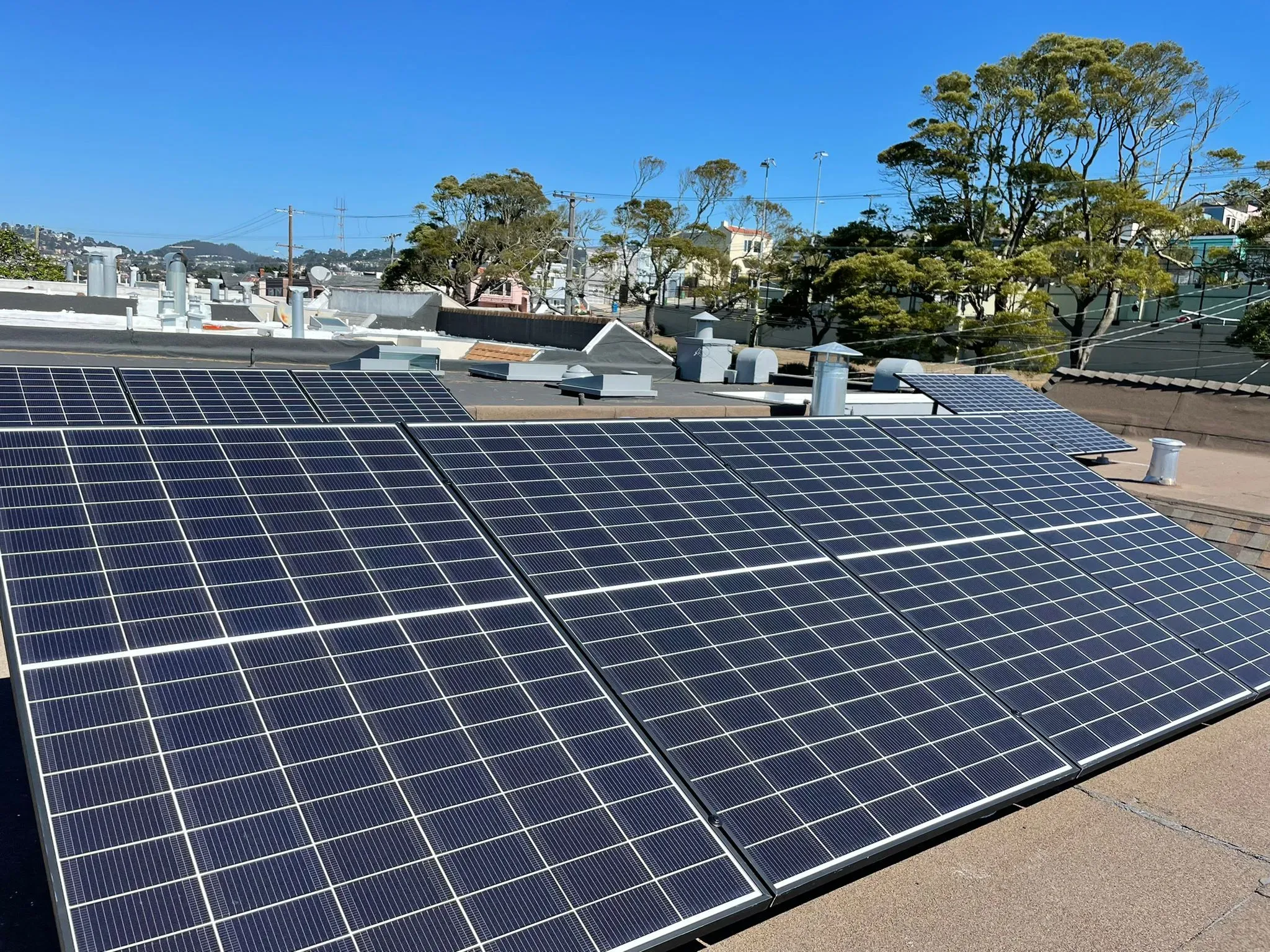 "Solar panels installed on a rooftop in San Francisco, showcasing SolarUnion's energy solutions."