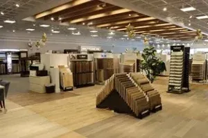 Interior view of The Floor Store in Richmond featuring various flooring displays and samples in a well-lit showroom.