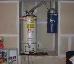 An image of a water heater installation in a utility room, provided by Water Heaters Masters Inc. in Vacaville.