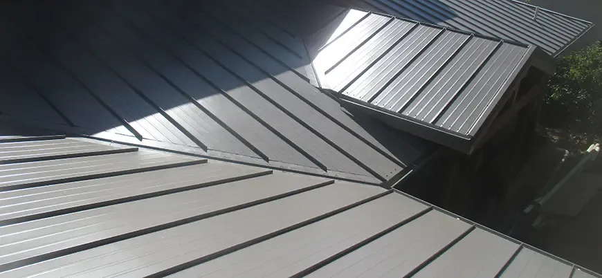 Overhead view of a metal roof with clean lines, installed by WedgeRoofing in Petaluma.