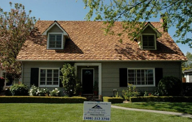 A charming house in San Jose showcasing a newly completed roof by Westshore Roofing, Inc., featuring a clean and elegant exterior, surrounded by a well-maintained yard.