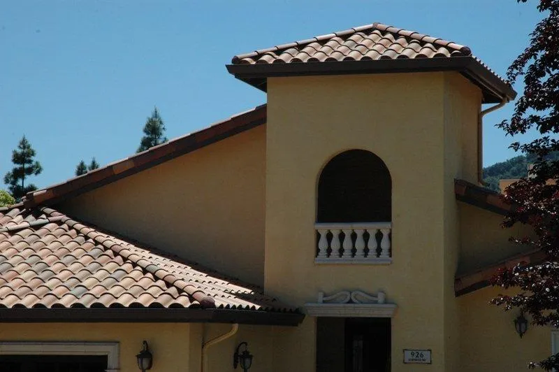 A Mediterranean-style home with a terracotta tile roof in San Jose, showcasing the expert craftsmanship of Westshore Roofing, Inc.